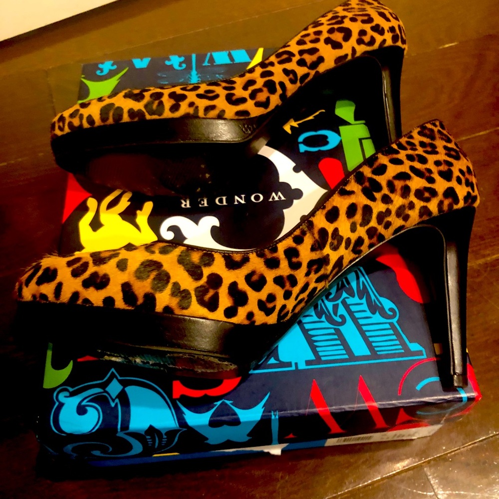 C. Wonder Leopard Platform Pumps